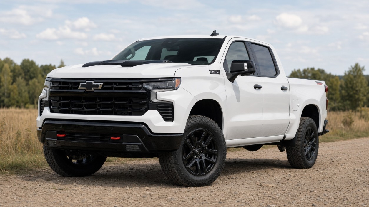 2026 Chevrolet Silverado 1500 LT Trail Boss lifted pickup parked on a gravel trail